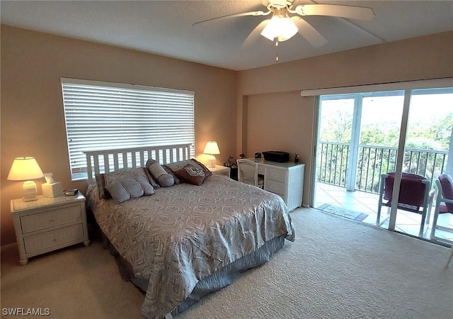 bedroom featuring ceiling fan, access to exterior, and light colored carpet