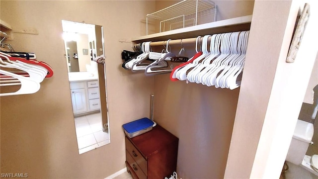 spacious closet with tile patterned flooring