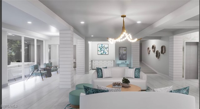 living room with a notable chandelier and decorative columns