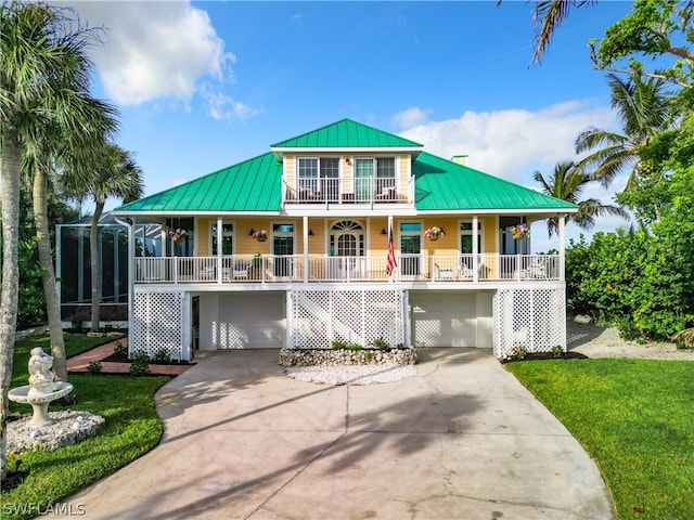 view of front of home featuring a garage and covered porch