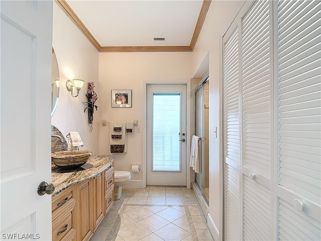 doorway to outside featuring crown molding, sink, and light tile patterned floors