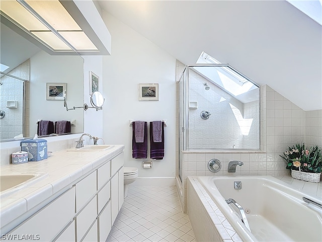 full bathroom with dual vanity, toilet, tile patterned floors, independent shower and bath, and lofted ceiling with skylight