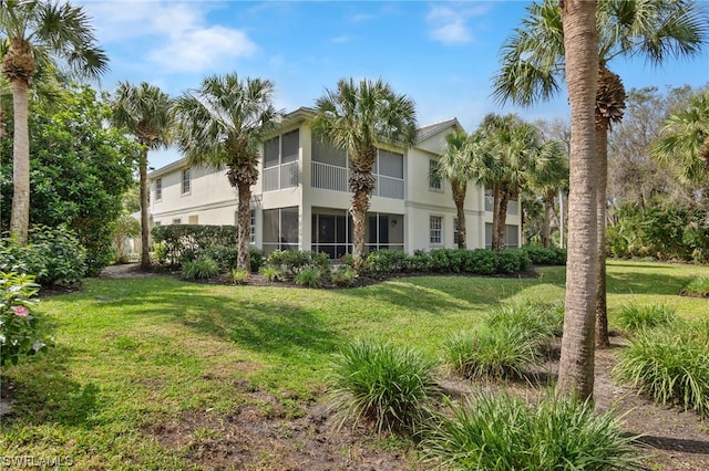 view of front of property with a front lawn