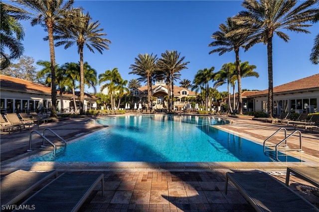 view of swimming pool featuring a patio area