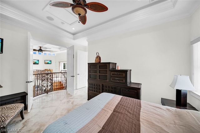 bedroom with light tile floors, ceiling fan, crown molding, and a raised ceiling