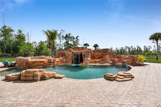 view of swimming pool featuring a patio area and pool water feature