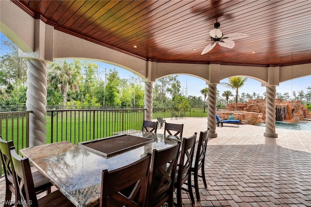 view of patio / terrace featuring ceiling fan