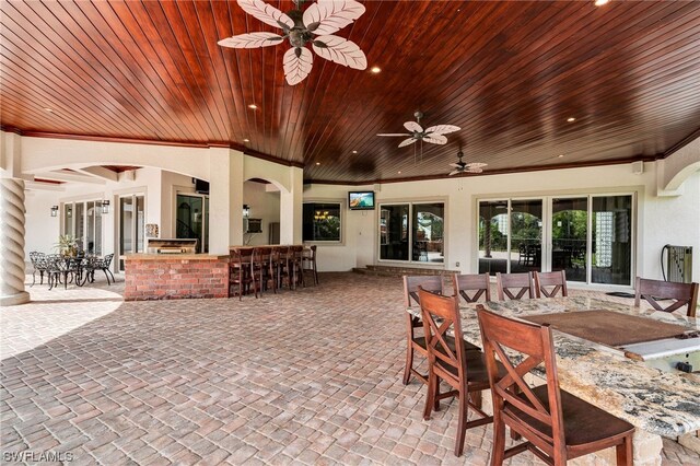 view of patio / terrace with ceiling fan