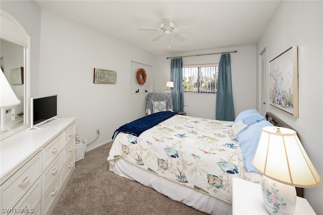 carpeted bedroom featuring ceiling fan