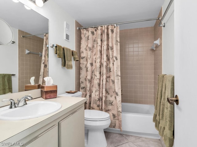 full bathroom with tile patterned flooring, vanity, toilet, and shower / bath combo