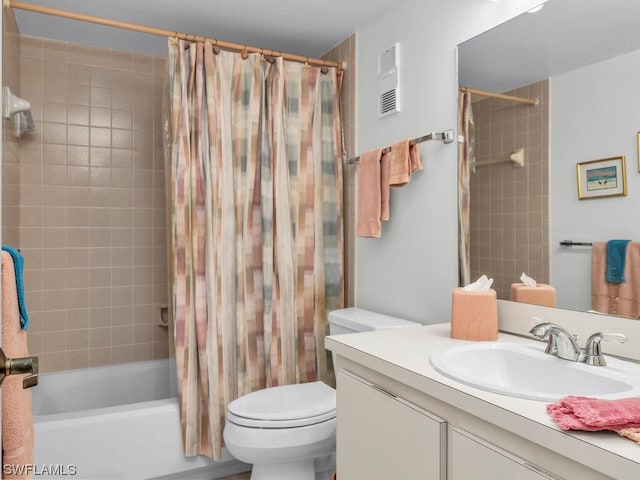 full bathroom with vanity, toilet, and shower / bath combo