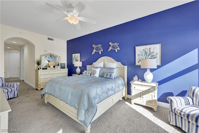 carpeted bedroom featuring ceiling fan