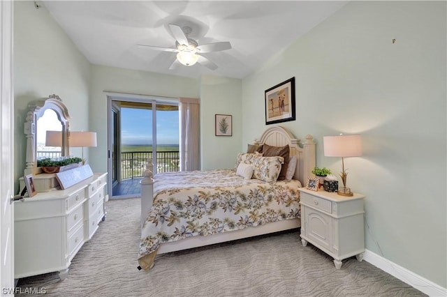 bedroom with light carpet, access to outside, and ceiling fan