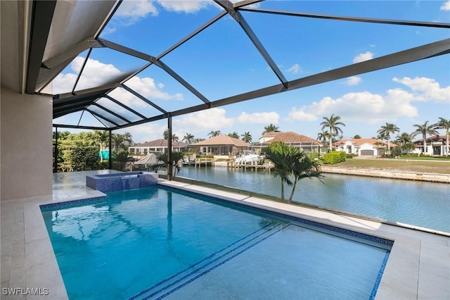 view of pool featuring a residential view, glass enclosure, a water view, and a patio