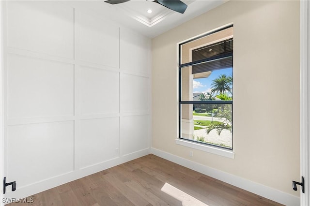 empty room with light wood finished floors, baseboards, a ceiling fan, and recessed lighting