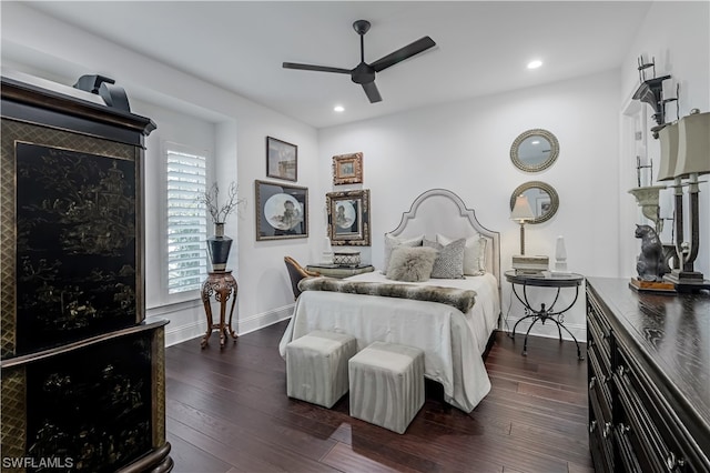 bedroom featuring ceiling fan and dark hardwood / wood-style floors