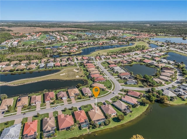 drone / aerial view featuring a water view