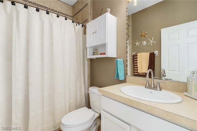 bathroom with toilet and oversized vanity