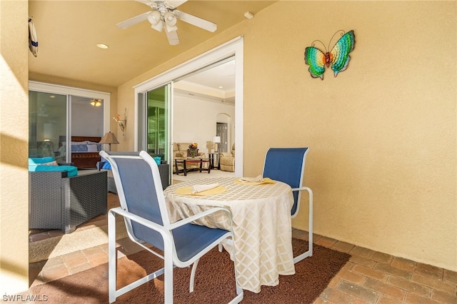 dining room featuring ceiling fan