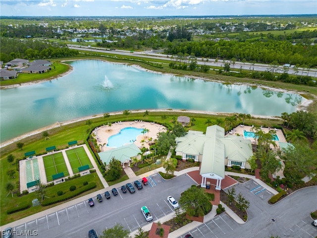 bird's eye view with a water view