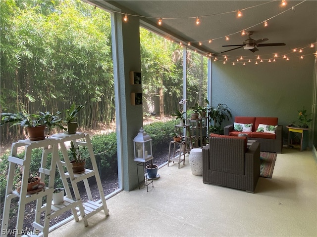 sunroom / solarium with ceiling fan