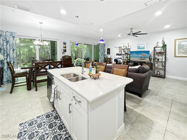 kitchen featuring recessed lighting, visible vents, a sink, and dishwasher