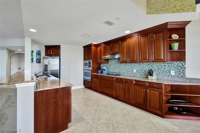 kitchen featuring decorative backsplash, light stone counters, light tile patterned flooring, and stainless steel appliances