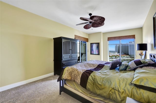 bedroom with ceiling fan and carpet floors