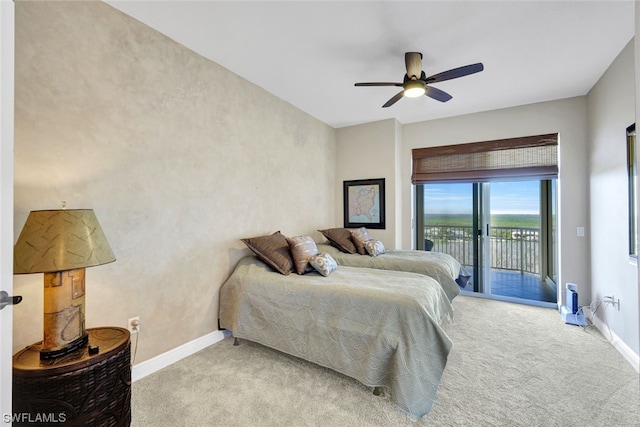 bedroom featuring light carpet, access to outside, and ceiling fan