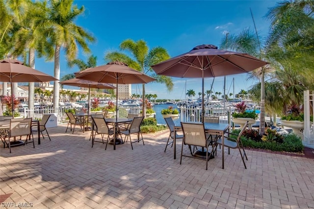 view of patio featuring a water view