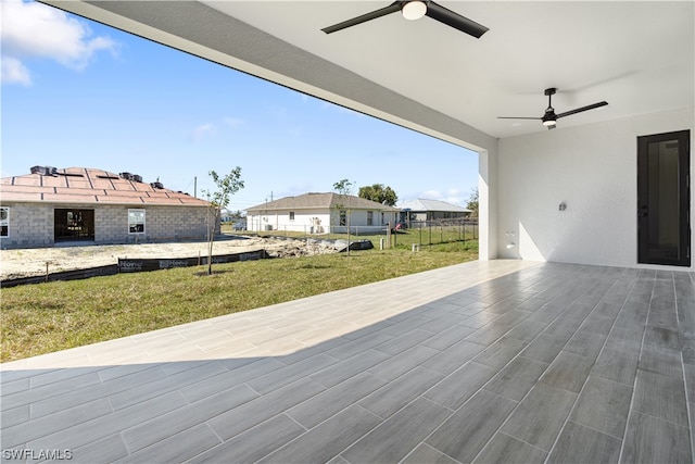 view of patio with ceiling fan