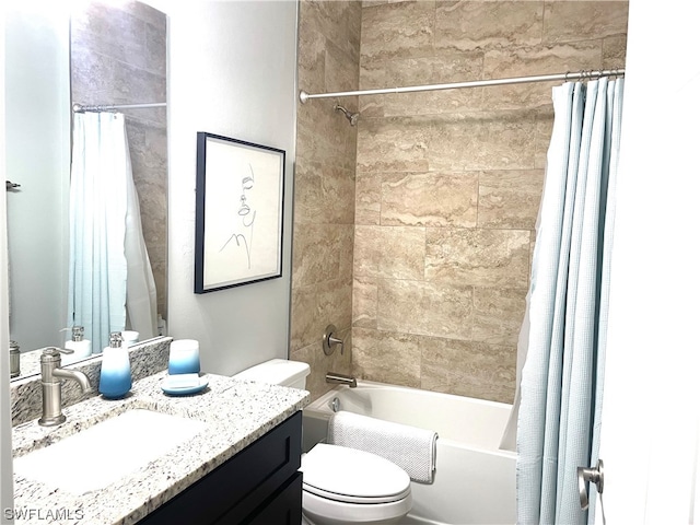 full bathroom featuring vanity, toilet, and shower / bathtub combination with curtain