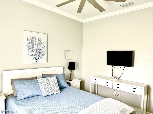 bedroom with crown molding and ceiling fan