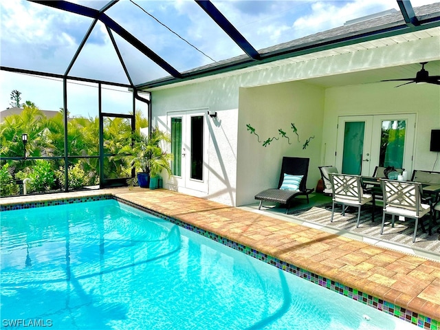 view of pool featuring french doors, a lanai, ceiling fan, and a patio