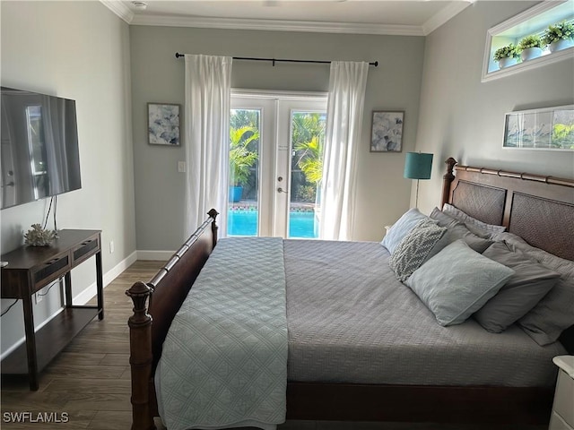 bedroom with dark hardwood / wood-style flooring, access to exterior, and ornamental molding