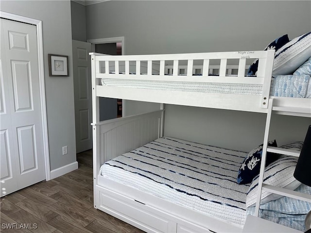 bedroom featuring dark wood-type flooring