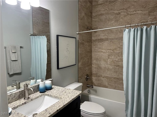 full bathroom with shower / tub combo, vanity, and toilet