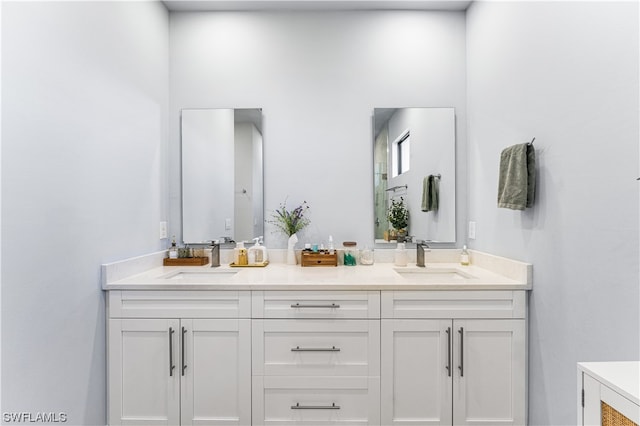 bathroom featuring double vanity