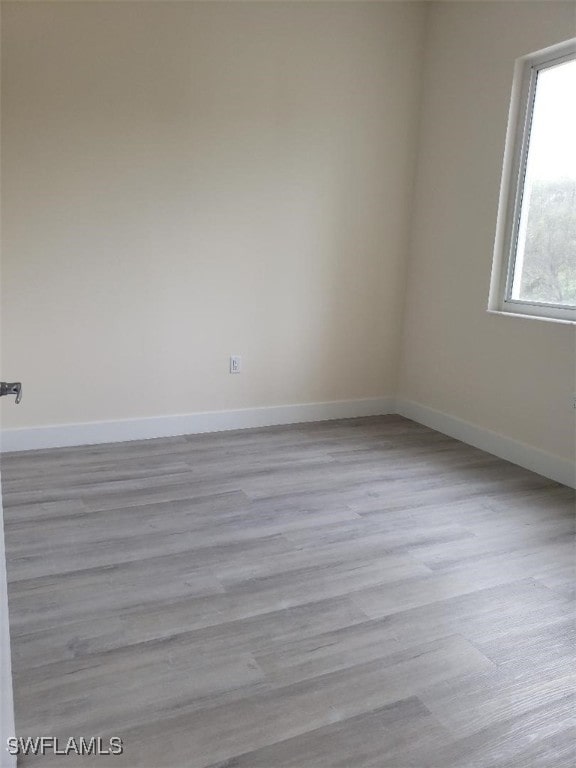 empty room featuring light hardwood / wood-style floors