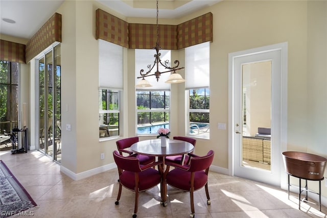 dining area with light tile flooring