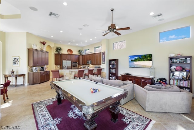 rec room with light tile flooring, billiards, and ceiling fan