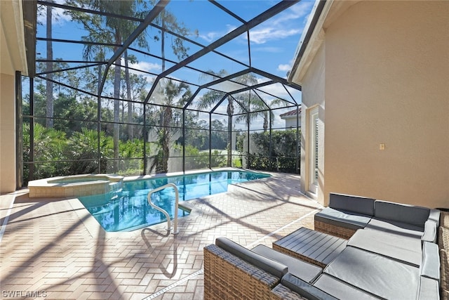 view of swimming pool with an in ground hot tub, glass enclosure, and a patio area