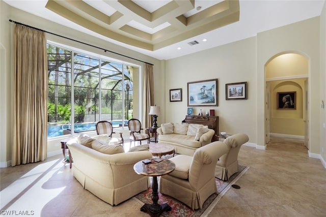 tiled living room with coffered ceiling