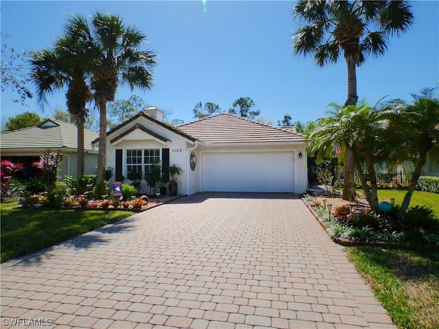 single story home with a garage