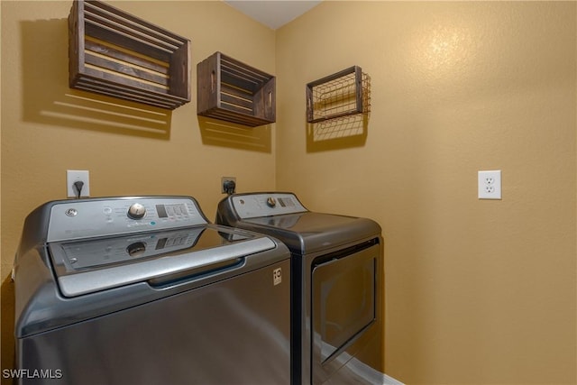 laundry room featuring washer and dryer