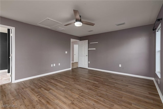 unfurnished bedroom featuring hardwood / wood-style floors and ceiling fan