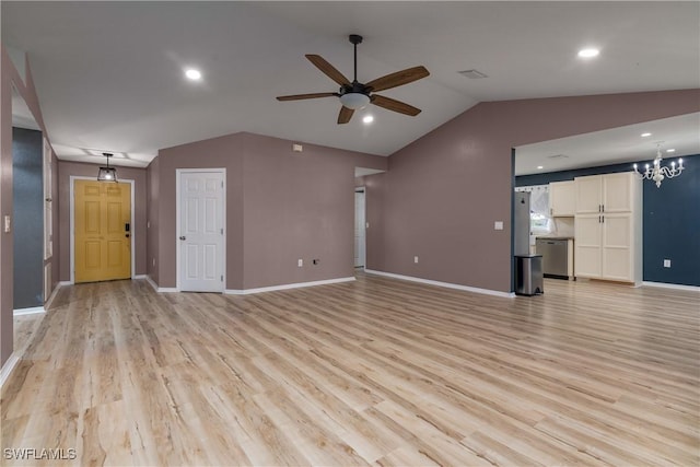 unfurnished living room featuring ceiling fan with notable chandelier, light hardwood / wood-style floors, and lofted ceiling