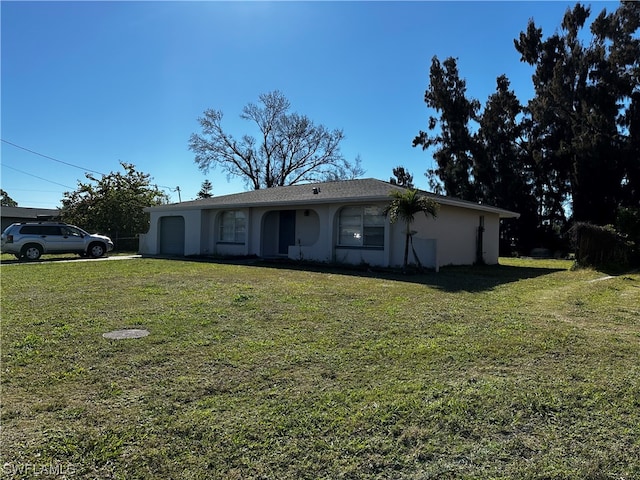 view of front of home with a front yard