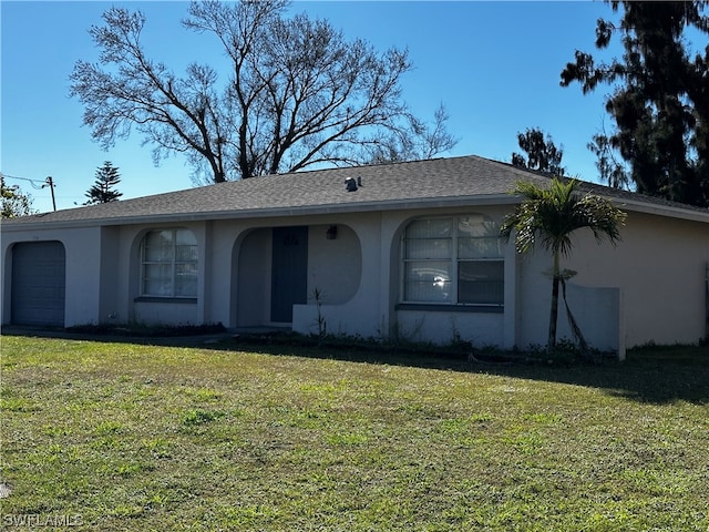 single story home with a front lawn