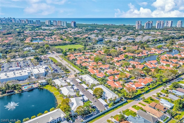 drone / aerial view with a water view